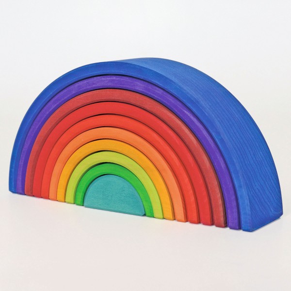 A wooden rainbow.  The colours are reversed, the largest arch is blue and the middle colours are red, then green, then an aqua in the centre